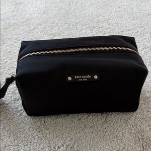 kate spade black nylon cosmetic case with gold zipper